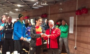 Frank receiving his gold medal for winning the M60 title.